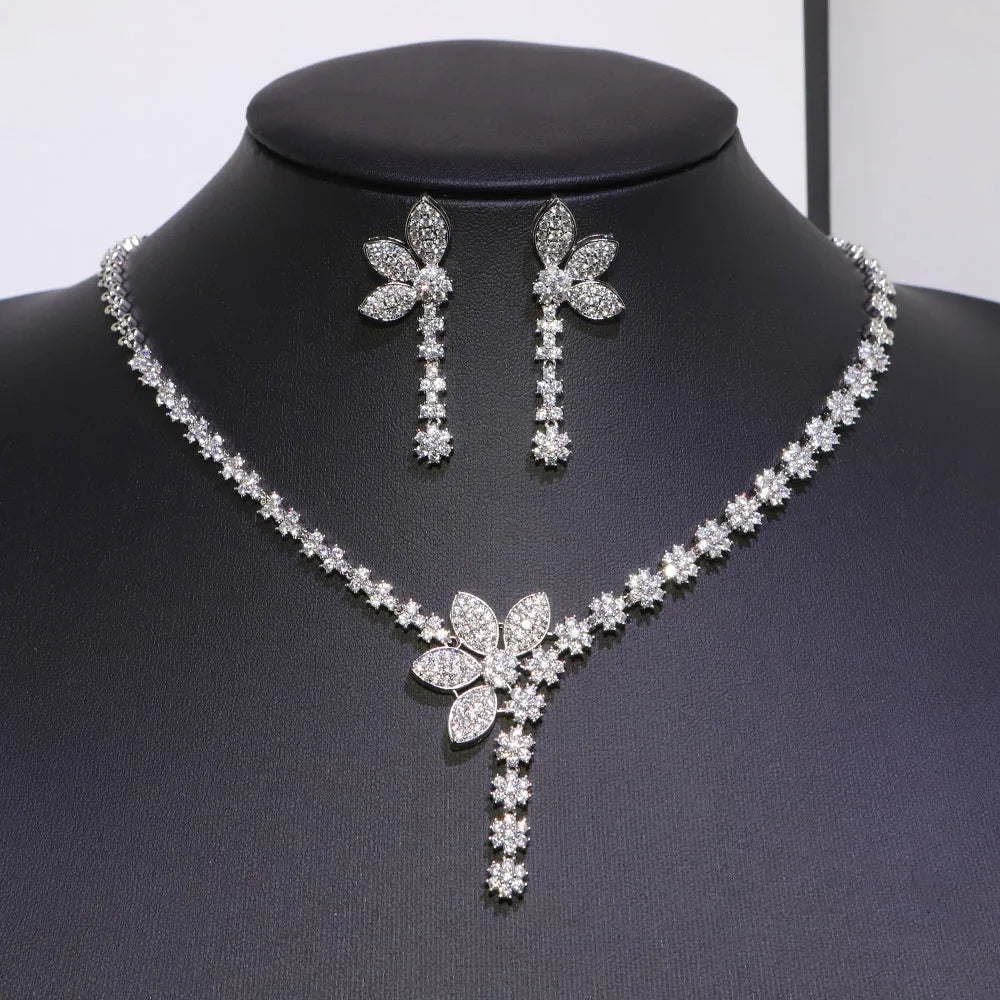 Decorative silver flower necklaces and earrings