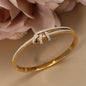 Crystal Cutout Knot Stainless Steel Gold Colour Charm Bracelet