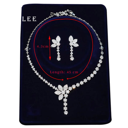 Decorative silver flower necklaces and earrings
