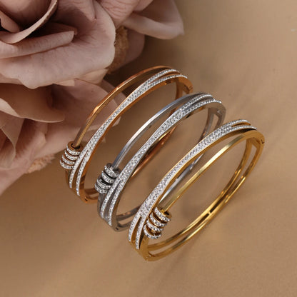 Crystal Cutout Knot Stainless Steel Gold Colour Charm Bracelet